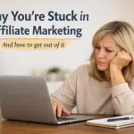 why you’re stuck in affiliate marketing beginner overwhelmed laptop